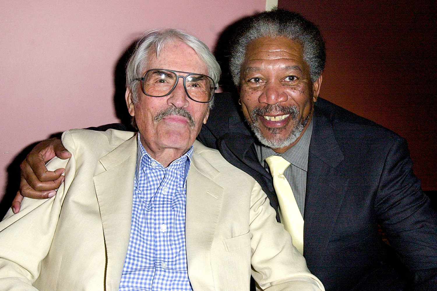 US actor/executive producer Morgan Freeman (R) hug