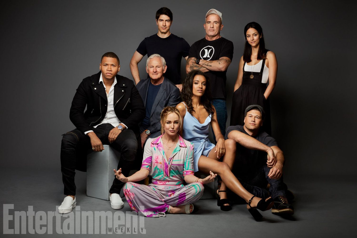 DC'S Legends of Tomorrow stars: (standing) Brandon Routh, Dominic Purcell,&nbsp;Tala Ashe,&nbsp;(sitting) Franz Drameh, Victor Garber, Caity Lotz, Maisie Richardson-Sellers, and Nick Zano
