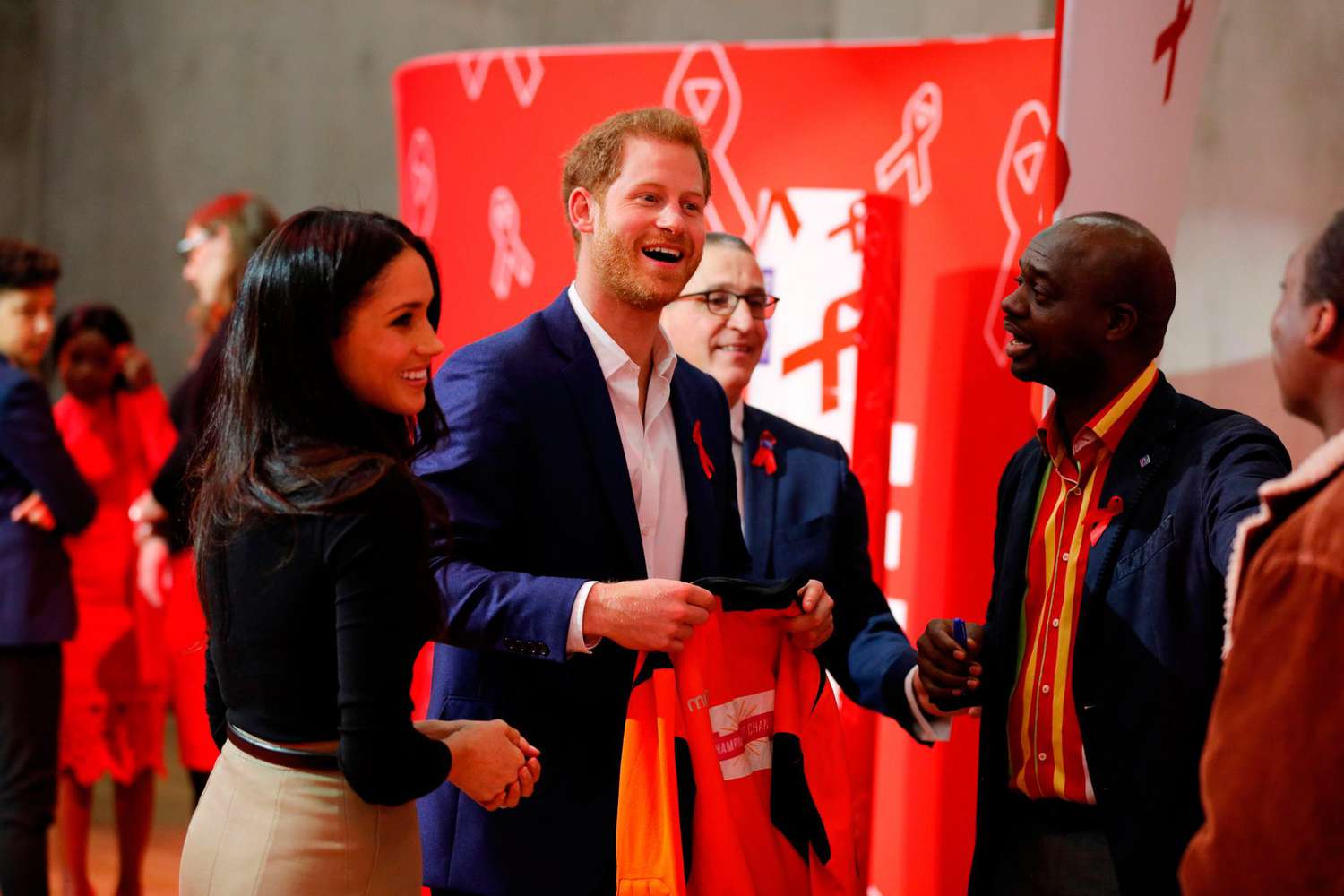 Meghan Markle and Prince Harry inside the Terrence Higgins Trust World AIDS Day charity fair at Nottingham Contemporary