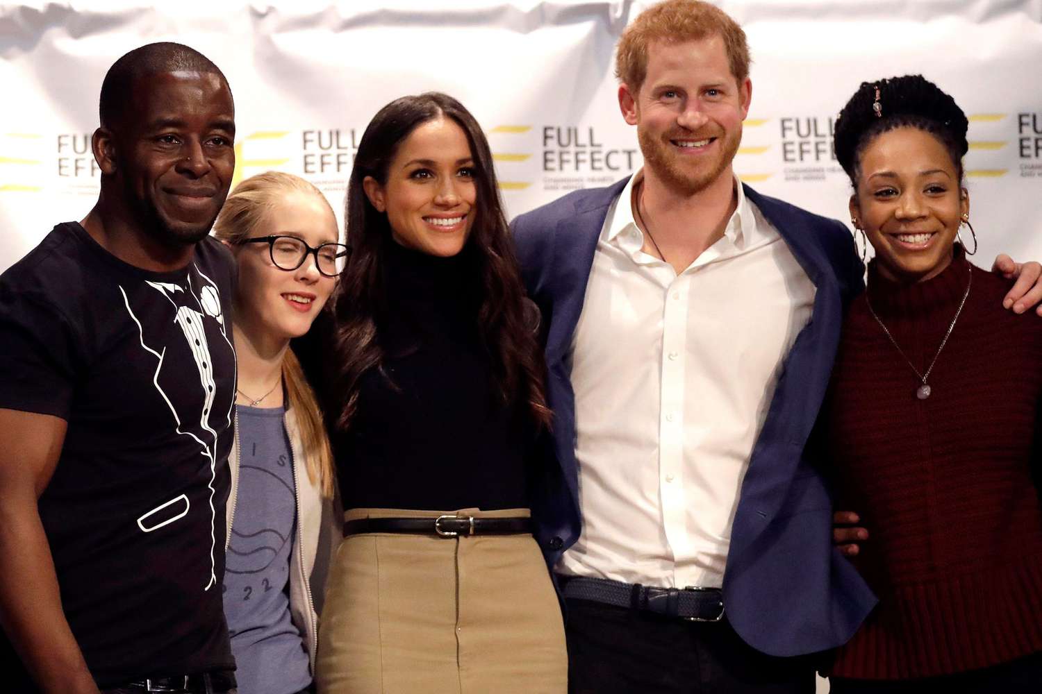 Meghan Markle and Prince Harry pose with hip-hop crew Full Effect at Nottingham Academy
