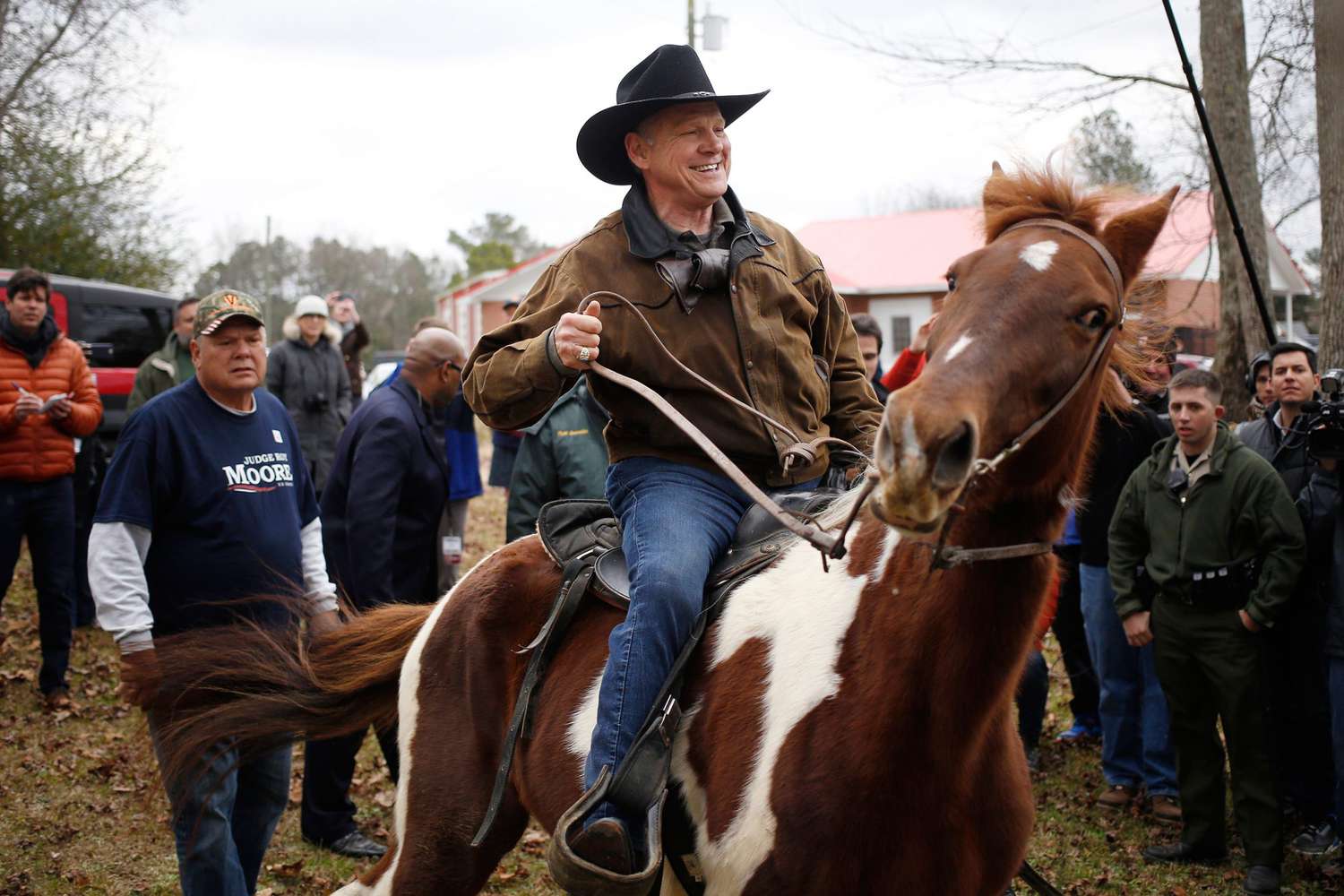 Republican Senate Candidate Roy Moore Travels To His Polling Location On Horseback