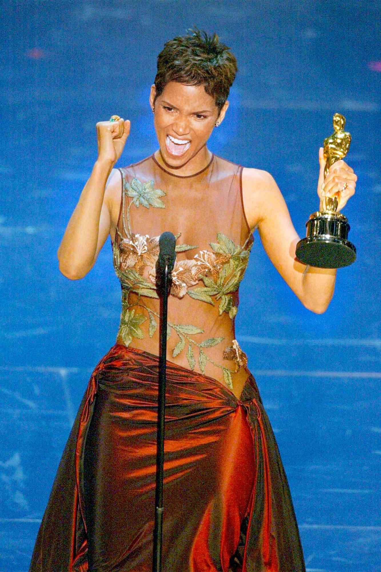 US actress Halle Berry accepts her Oscar for best