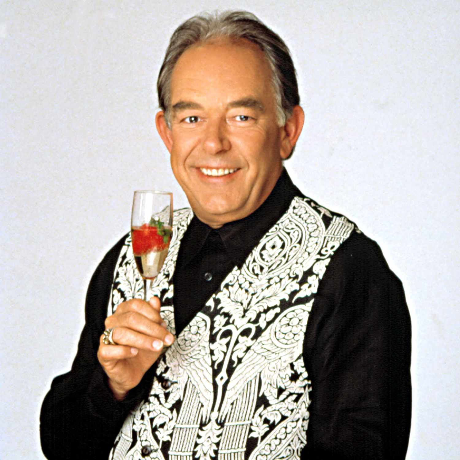 LIFESTYLES OF THE RICH AND FAMOUS, host, Robin Leach, 1984-1994.