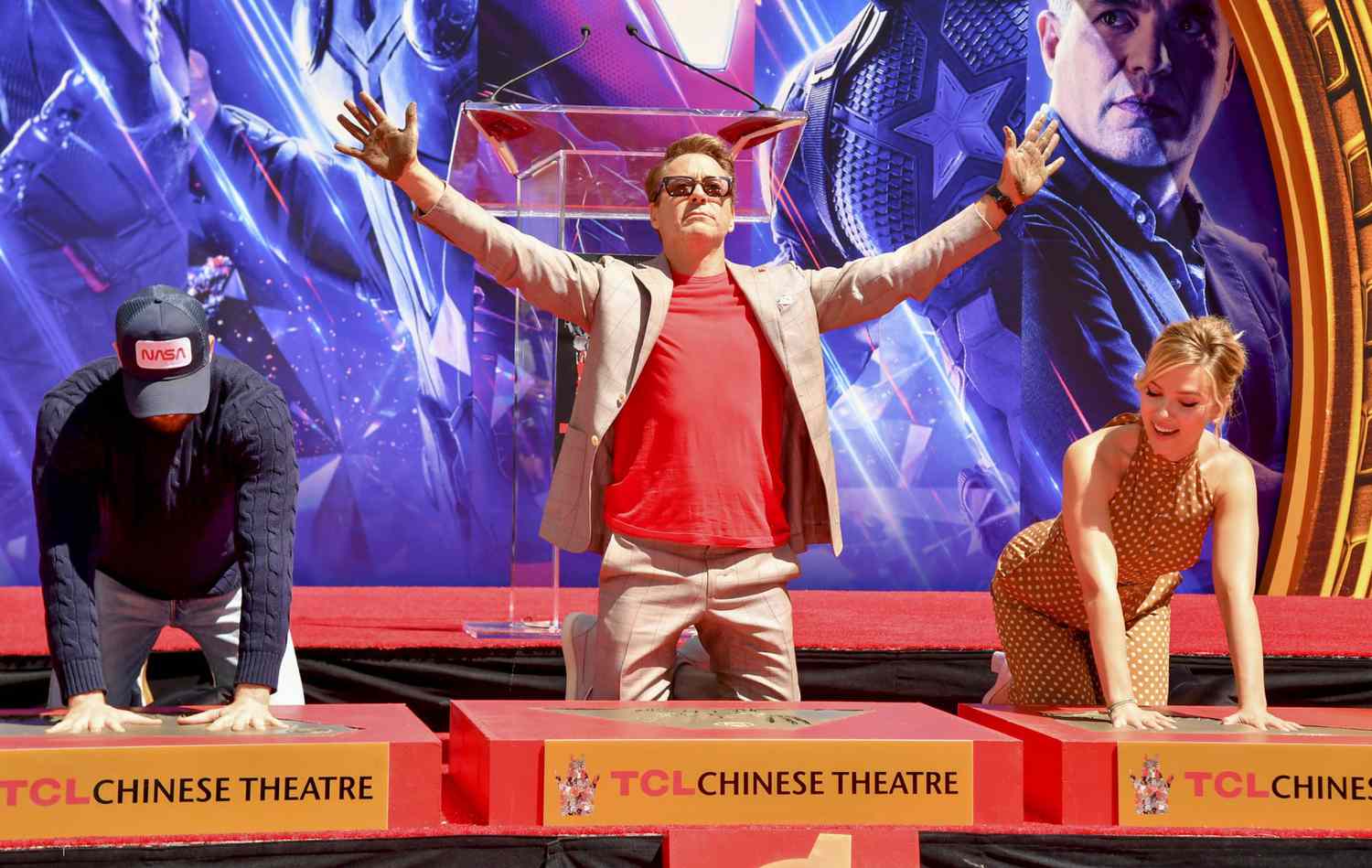 HOLLYWOOD, CALIFORNIA - APRIL 23: (L-R) Chris Evans, Robert Downey Jr., and Scarlett Johansson attend the Marvel Studios' "Avengers: Endgame" cast place their hand prints in cement at TCL Chinese Theatre IMAX Forecourt at TCL Chinese Theatre IMAX on April 23, 2019 in Hollywood, California.California. (Photo by Jeff Kravitz/FilmMagic)