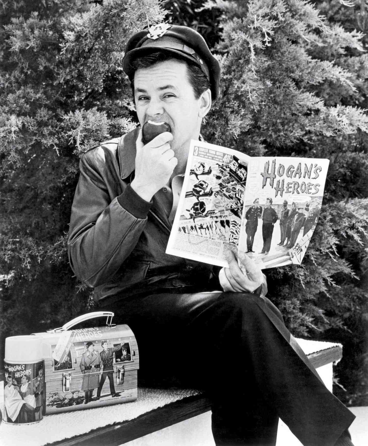 HOGAN'S HEROES, Bob Crane with thermos, lunchbox and comic book all product spinoffs from the show, 1965-1971