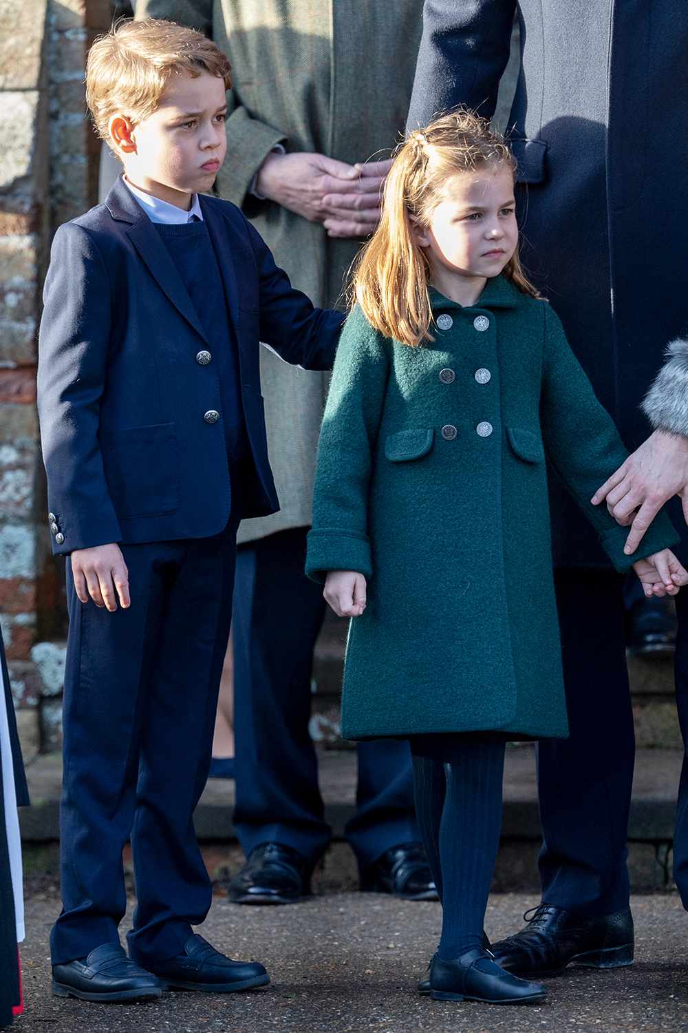 KING'S LYNN, ENGLAND - DECEMBER 25: Prince George of Cambridge and Princess Charlotte of Cambridge attend the Christmas Day Church service at Church of St Mary Magdalene on the Sandringham estate on December 25, 2019 in King's Lynn, United Kingdom. (Photo by Mark Cuthbert/UK Press via Getty Images)