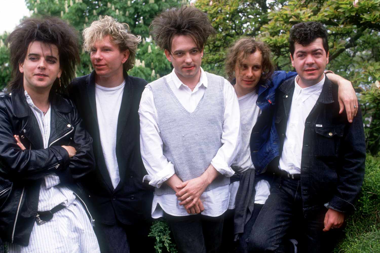 British group The Cure in 1987, the year they released the double album 'Kiss Me, Kiss Me, Kiss Me'. From left to right, they are bass player Simon Gallup, drummer Boris Williams, vocalist Robert Smith, guitarist Porl Thompson and keyboard player Laurence 'Lol' Tolhurst.