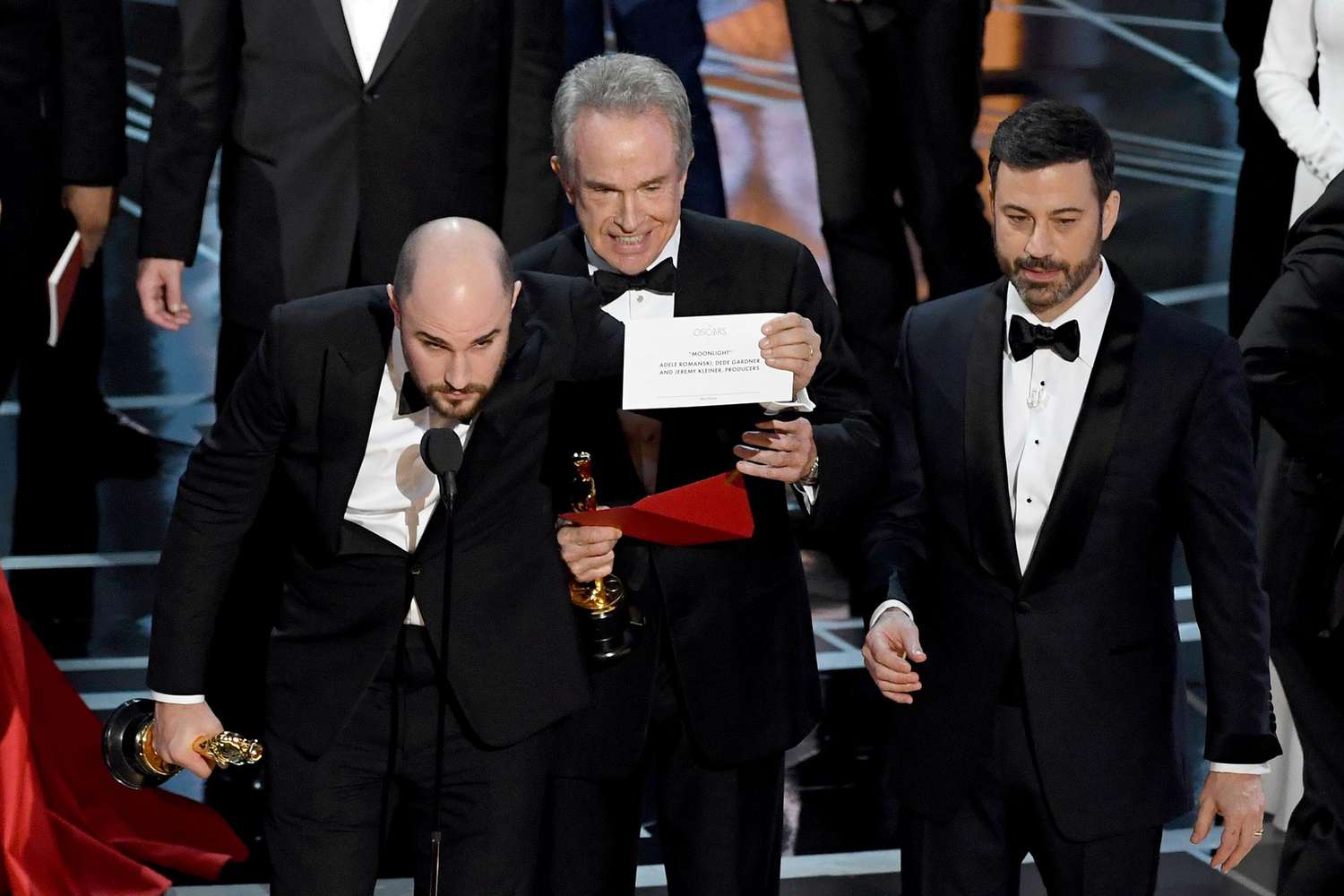 'La La Land' producer Jordan Horowitz holds up the winner card reading actual Best Picture winner 'Moonlight'