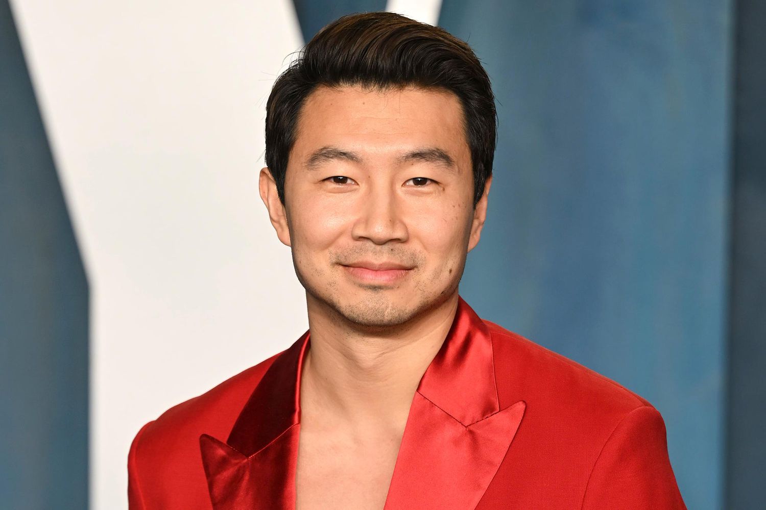 Simu Liu attends the 2022 Vanity Fair Oscar Party hosted by Radhika Jones at Wallis Annenberg Center for the Performing Arts on March 27, 2022 in Beverly Hills, California.