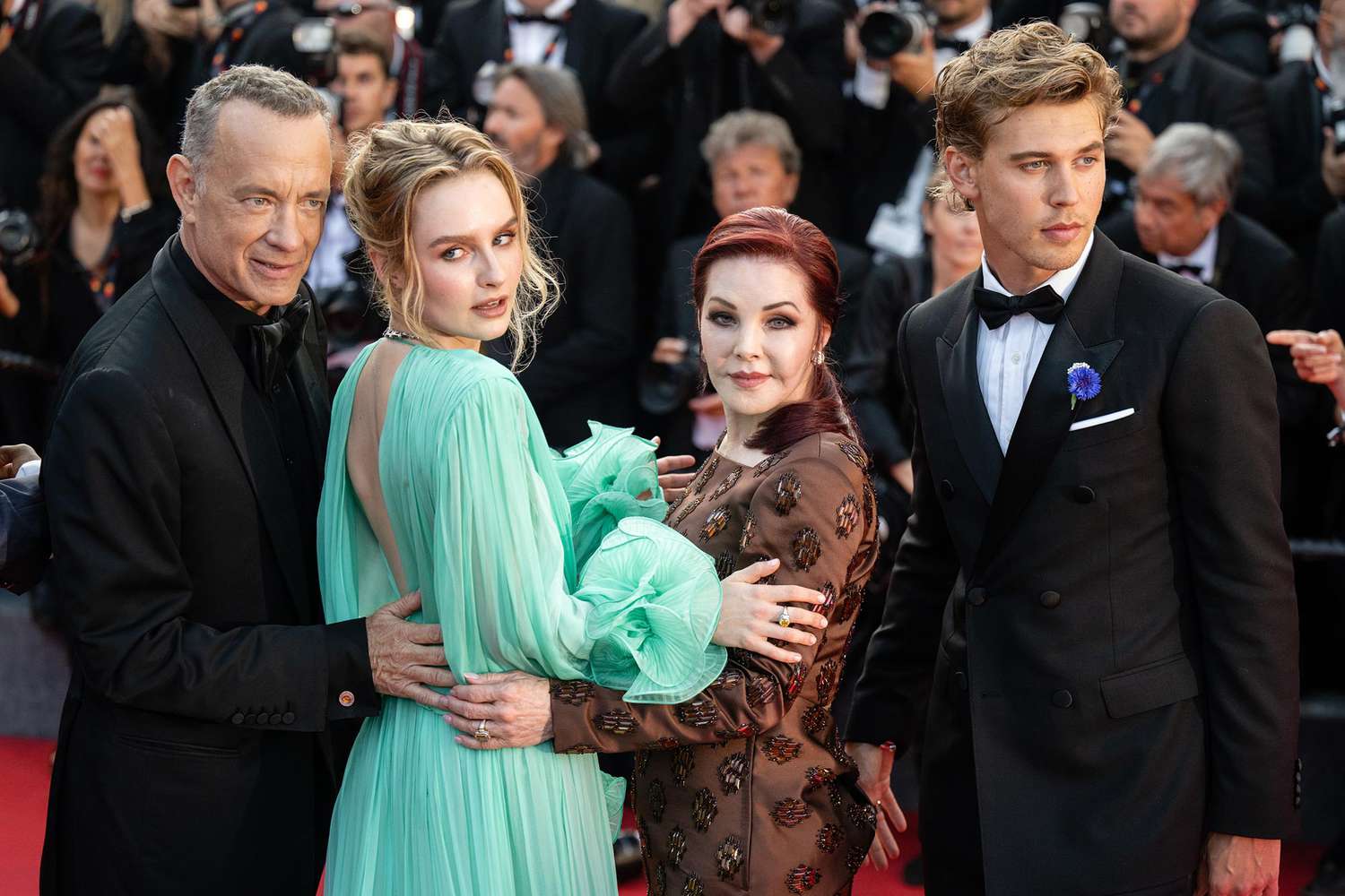 Tom Hanks, Olivia DeJonge, Priscilla Presley and Austin Butler attend the screening of "Elvis" during the 75th annual Cannes film festival at Palais des Festivals on May 25, 2022 in Cannes, France.