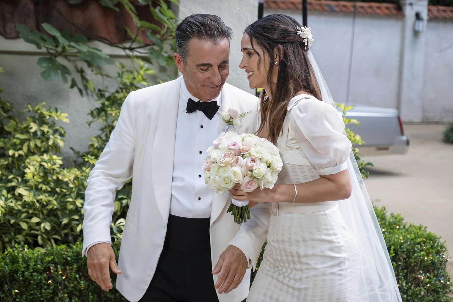 ANDY GARCIA as Billy and ADRIA ARJONA as Sofia in Warner Bros. Pictures' and HBO Max’s "FATHER OF THE BRIDE.”