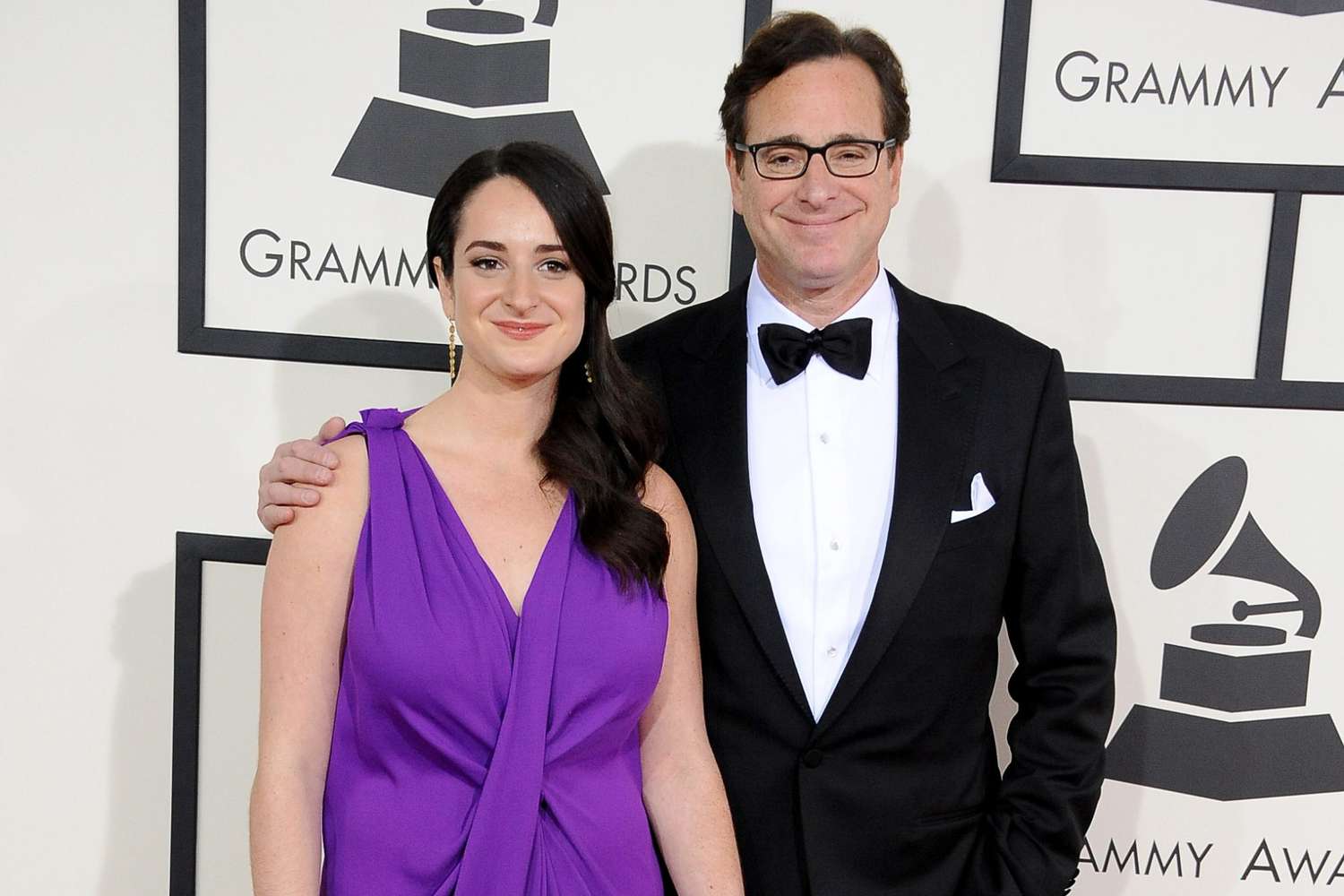 LOS ANGELES, CA - JANUARY 26: Comedian Bob Saget (R) and Lara Saget attend the 56th GRAMMY Awards at Staples Center on January 26, 2014 in Los Angeles, California. (Photo by Steve Granitz/WireImage)