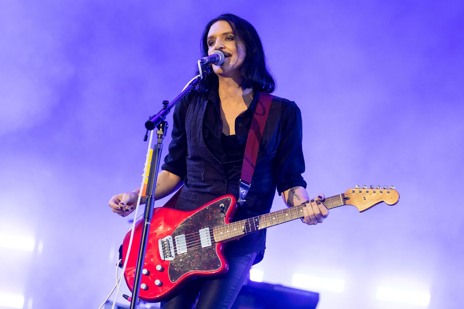 Frontman Brian Molko of the British band "Placebo" is on stage at the open-air festival "Rock im Park". It is one of the biggest music festivals in Bavaria. After a two-year break from the festival, around 75,000 music fans celebrated exuberantly at "Rock im Park".