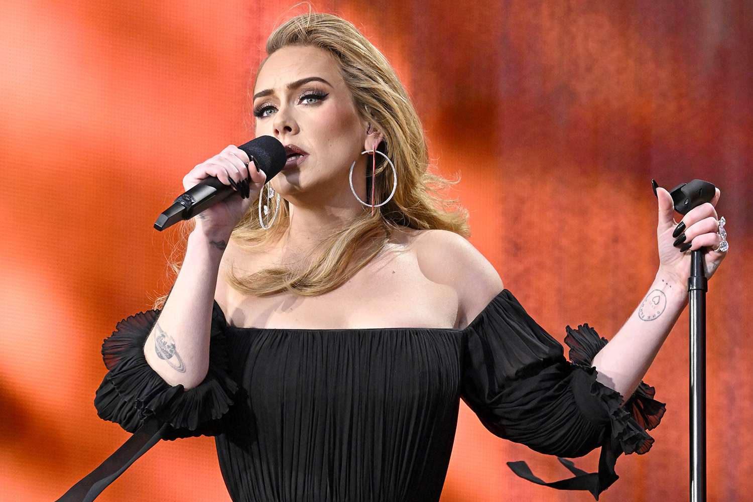 LONDON, ENGLAND - JULY 02: Adele performs on stage as American Express present BST Hyde Park in Hyde Park on July 02, 2022 in London, England. (Photo by Gareth Cattermole/Getty Images for Adele)
