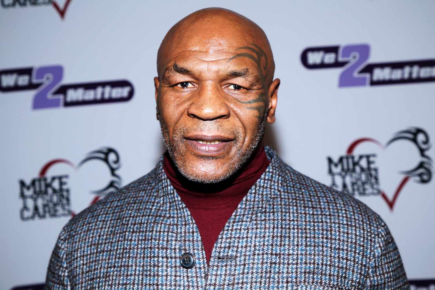 NEWPORT BEACH, CALIFORNIA - DECEMBER 05: Mike Tyson attends the Mike Tyson Cares & We 2 Matter Fundraiser on December 05, 2021 in Newport Beach, California. (Photo by Phillip Faraone/Getty Images)