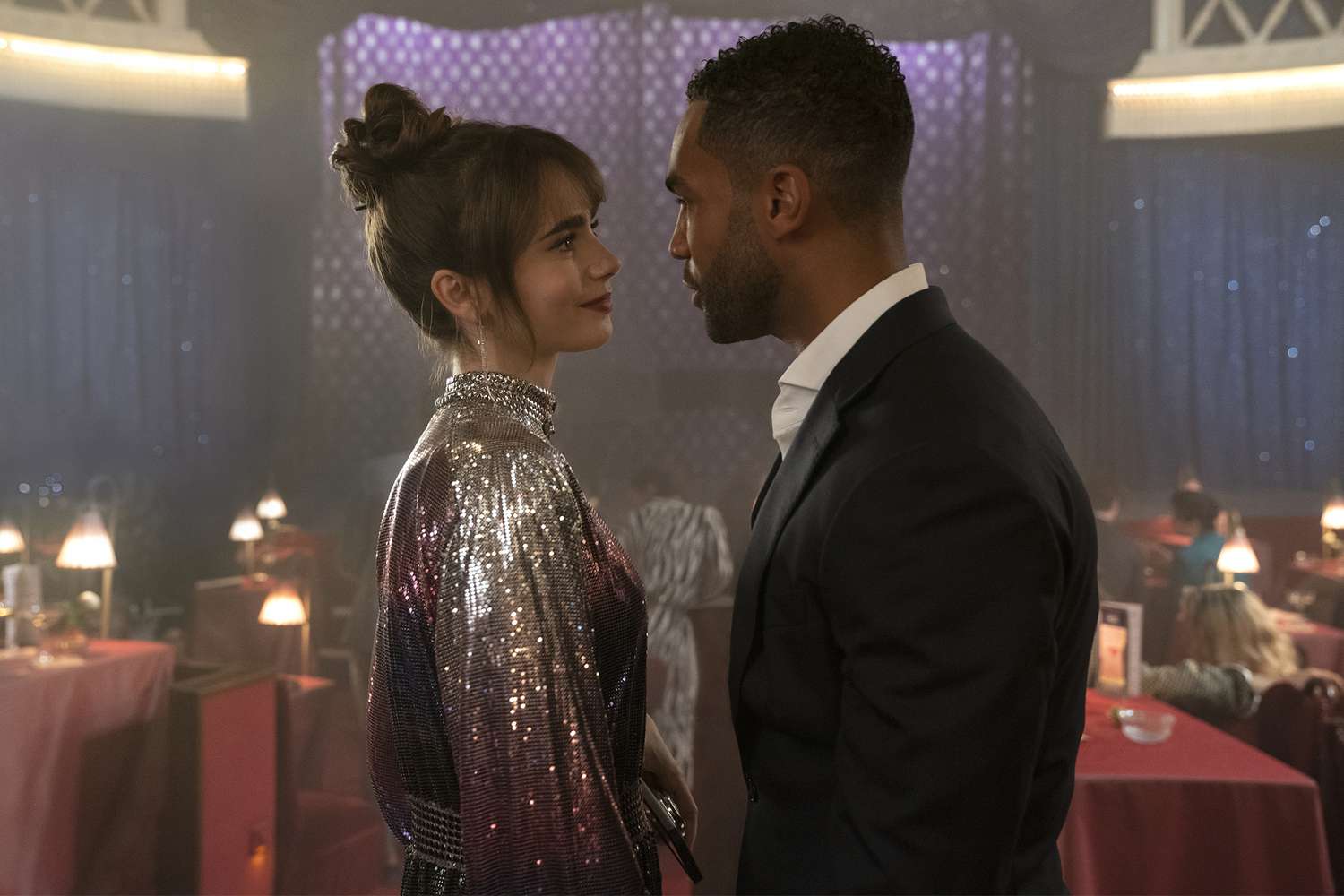 Emily in Paris. (L to R) Lily Collins as Emily, Lucien Laviscount as Alfie in episode 303 of Emily in Paris. Cr. Stéphanie Branchu/Netflix © 2022