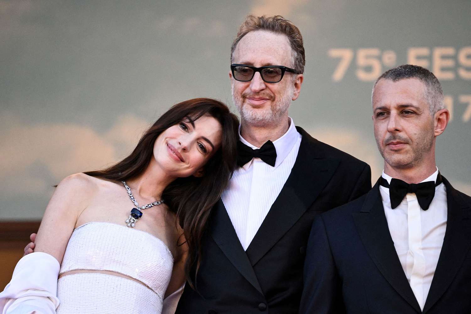 US actress Anne Hathaway, US director James Gray and US actor Jeremy Strong arrive for the screening of the film "Armageddon Time" during the 75th edition of the Cannes Film Festival in Cannes, southern France, on May 19, 2022.
