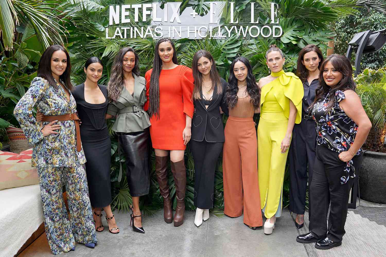 LOS ANGELES, CALIFORNIA - OCTOBER 16: (L-R) Melissa Fumero, Camila Mendes, Zoe Saldana, Lee Rodriguez, Victoria Justice, Aimee Garcia, Karla Souza, Génesis Rodríguez and Cristela Alonzo attend Netflix and Elle's Celebration of Latinas in Hollywood at Ka’teen on October 16, 2022 in Los Angeles, California. (Photo by Presley Ann/Getty Images for Netflix)