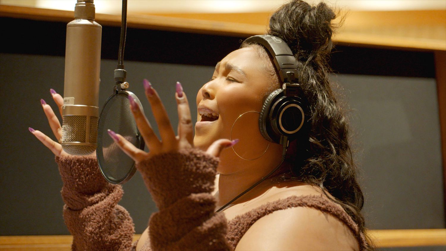 Lizzo recording 'About Damn Time,' as seen in 'Love, Lizzo'