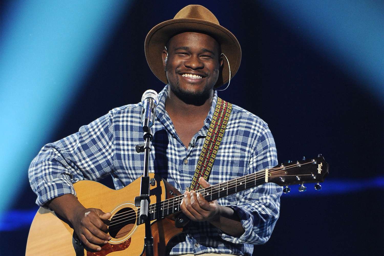 Contestant C.J. Harris performs onstage on FOX's "American Idol" Season 13 Men Perform Live Show on February 19, 2014 in Hollywood, California.