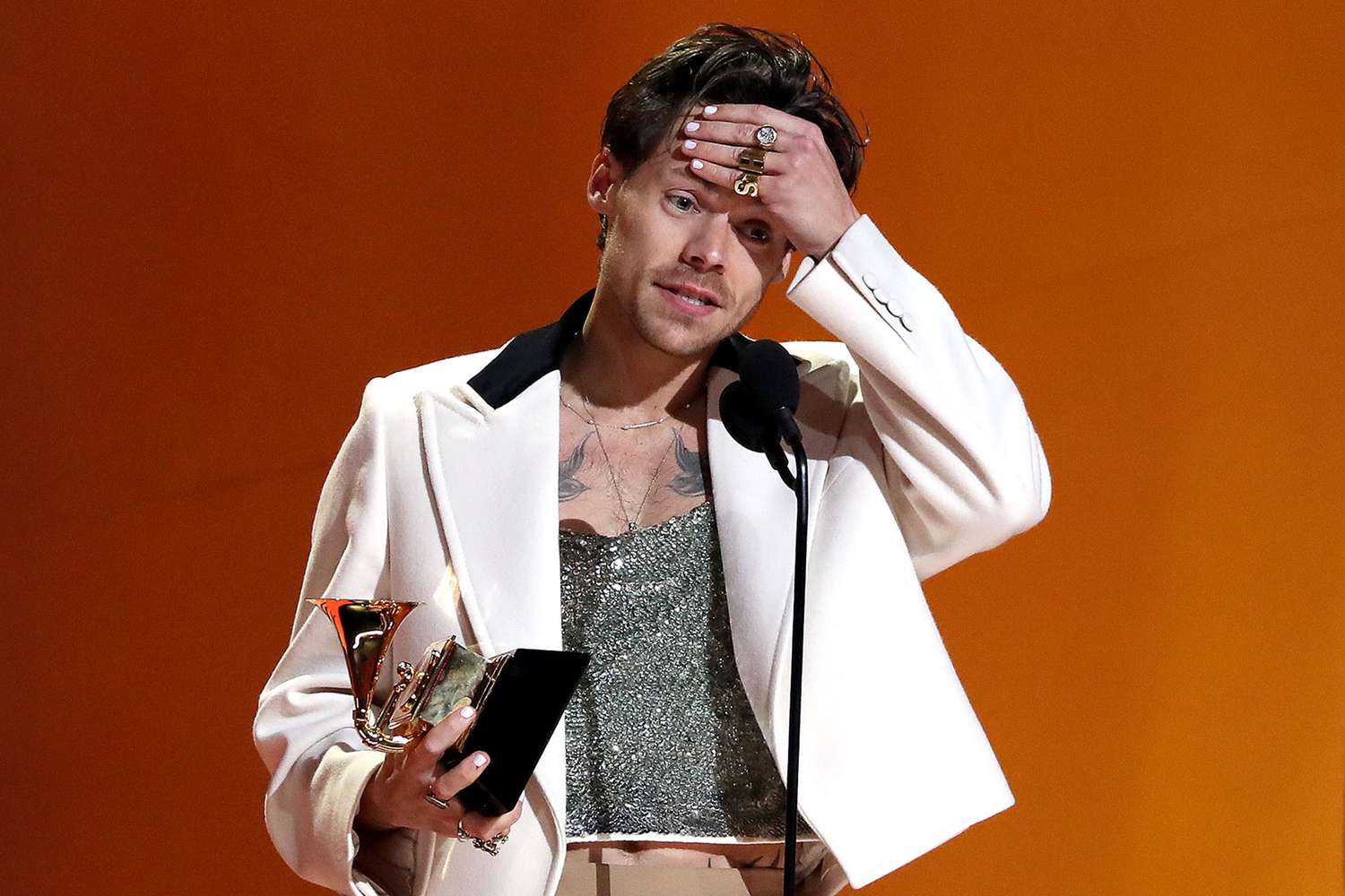 Harry Styles accepts the Album Of The Year award for “Harry's House” onstage during the 65th GRAMMY Awards at Crypto.com Arena on February 05, 2023 in Los Angeles, California.