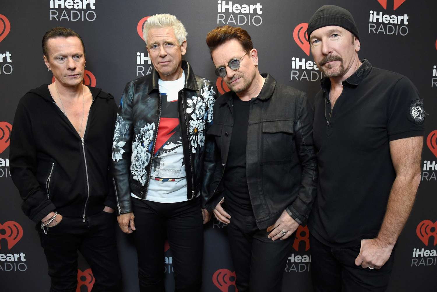 LAS VEGAS, NV - SEPTEMBER 23: (L-R) Recording artists Larry Mullen Jr., Adam Clayton, Bono, and The Edge of music group U2 pose at the 2016 iHeartRadio Music Festival at T-Mobile Arena on September 23, 2016 in Las Vegas, Nevada. (Photo by Kevin Mazur/WireImage)