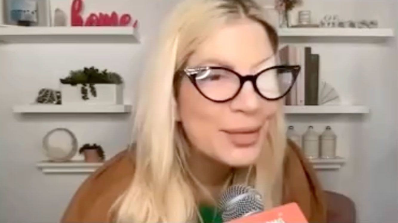 Tori Spelling Wearing an earpatch on the 9021omgpodcast