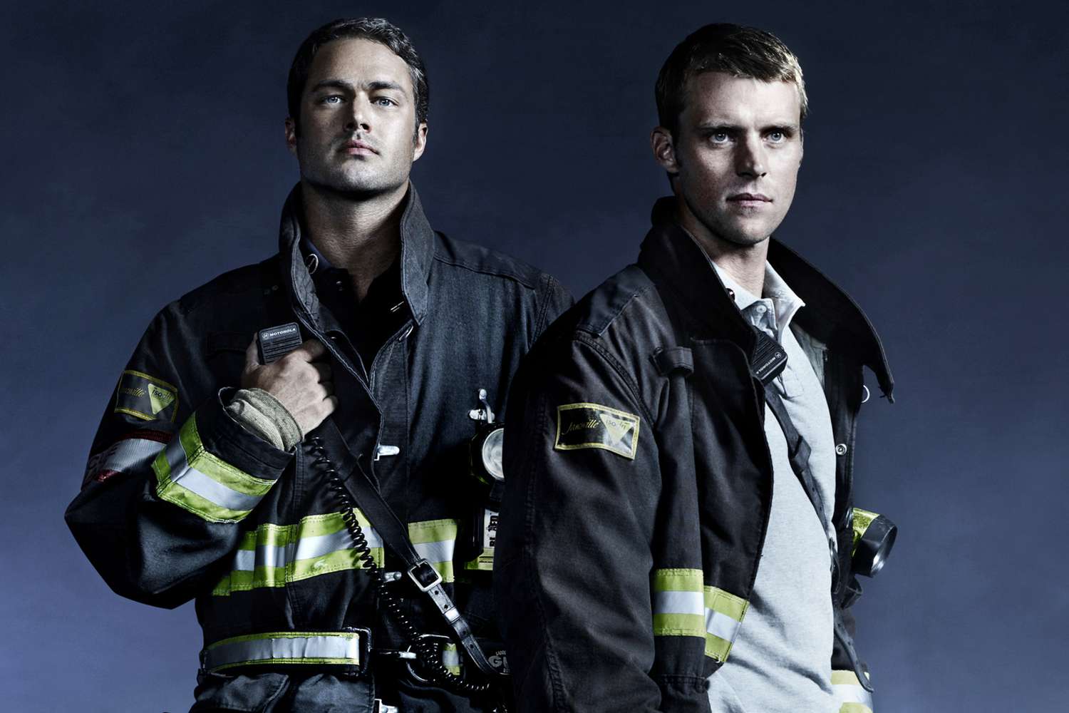 CHICAGO FIRE -- Season: 2 -- Pictured: (l-r) Taylor Kinney as Kelly Severide, Jesse Spencer as Matthew Casey -- (Photo by: Nino Munoz/NBCU Photo Bank/NBCUniversal via Getty Images via Getty Images)