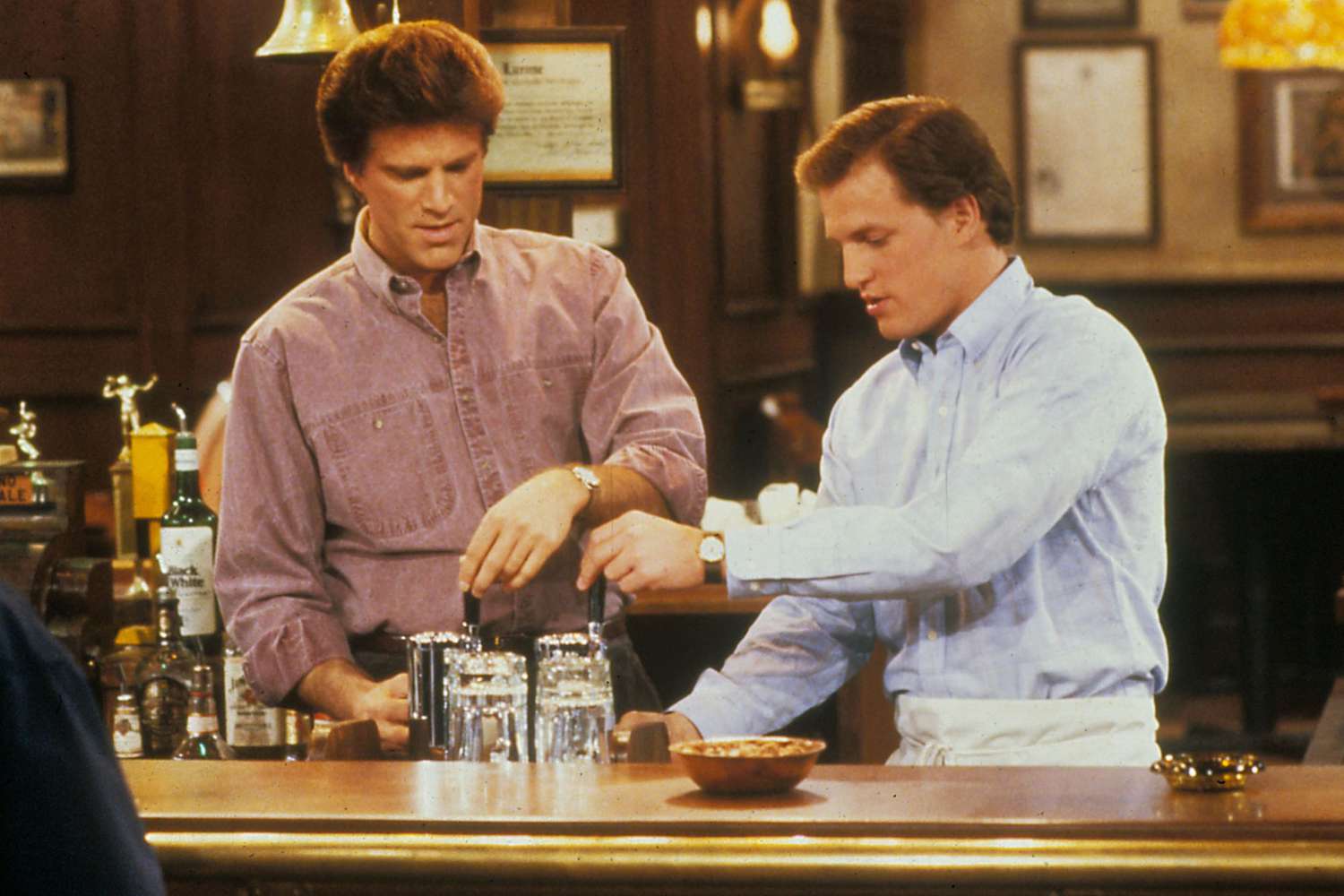 Editorial use only. No book cover usage. Mandatory Credit: Photo by Moviestore/Shutterstock (1539449a) Cheers 1982-1993, Ted Danson, Woody Harrelson Film and Television