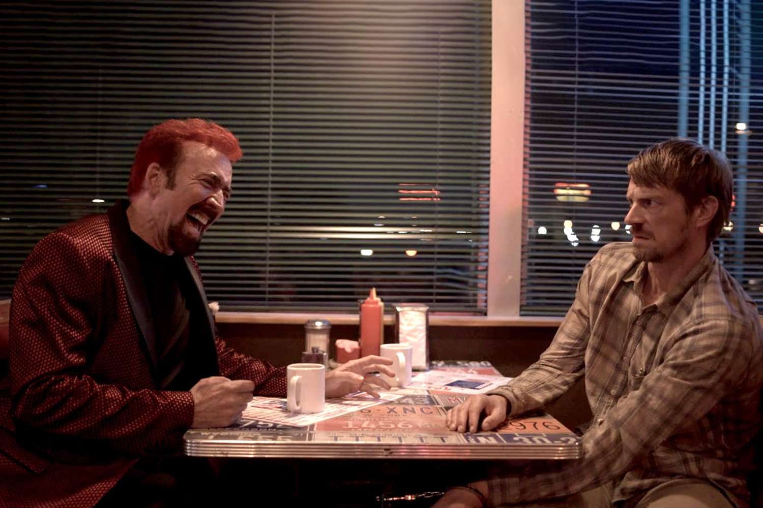 Nicolas Cage and Joel Kinnaman in the thriller, SYMPATHY FOR THE DEVIL