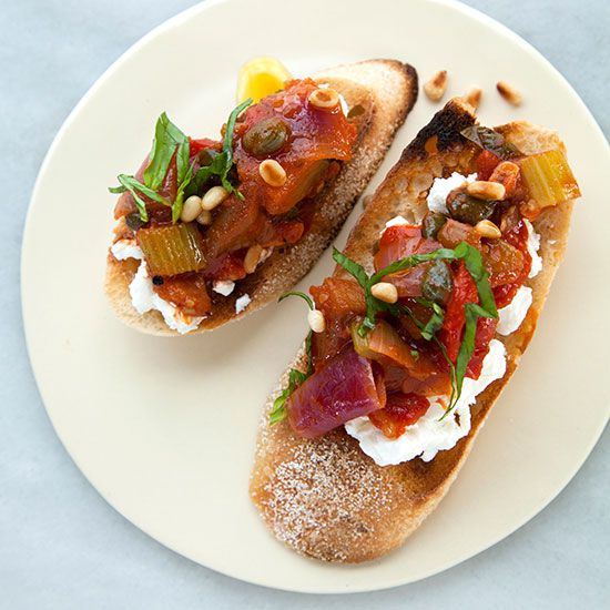 Caponata Crostini with Goat Cheese and Toasted Pine Nuts