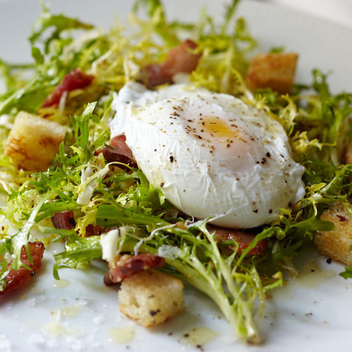 Curly-Endive Salad with Bacon and Poached Eggs 