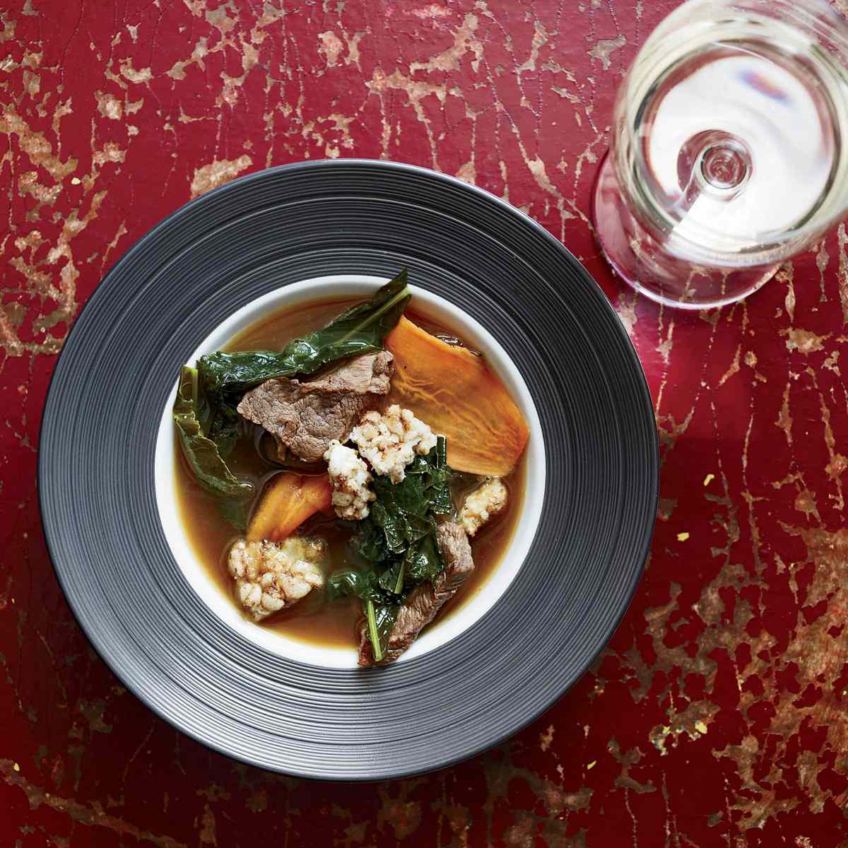 Pork-and-Kale Soup with Sizzling Puffed Rice 
