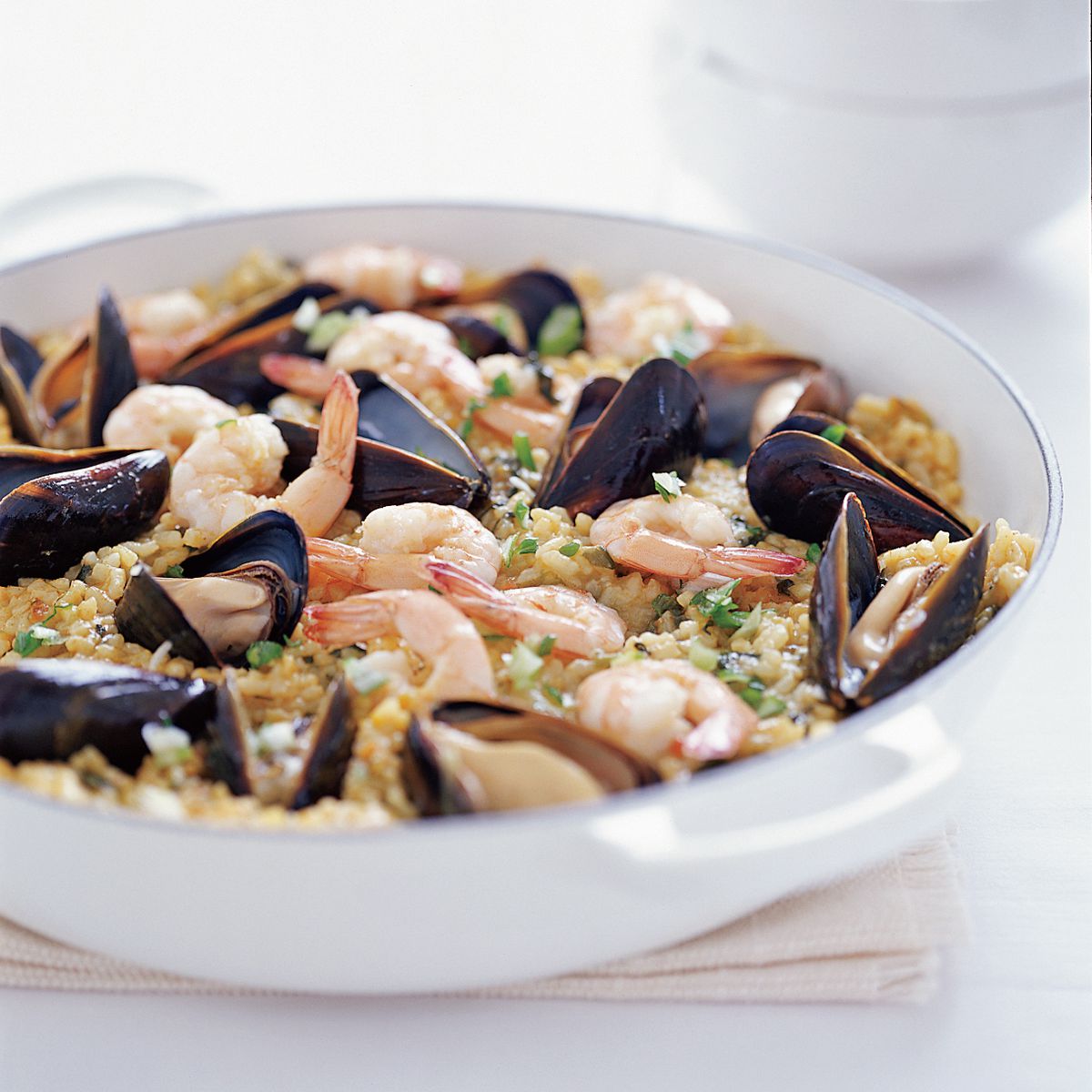 Seafood Paella with Spinach and Arugula 