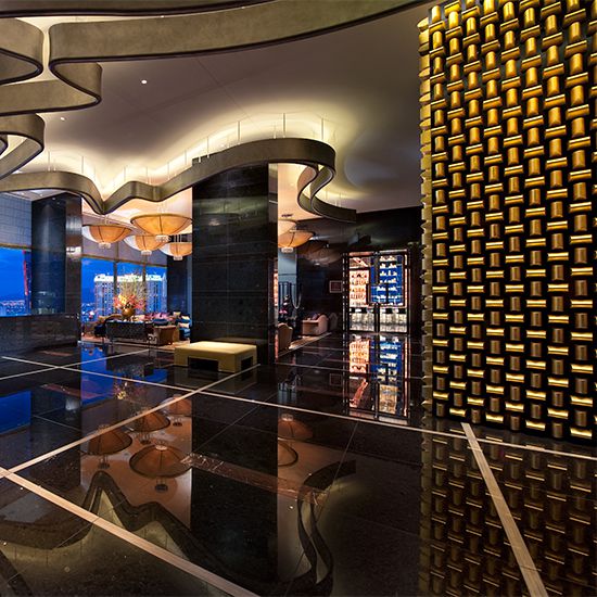 Iconic Restaurant Designs by Adam Tihany: The Gold Bullion Wall at Mandarin Oriental.