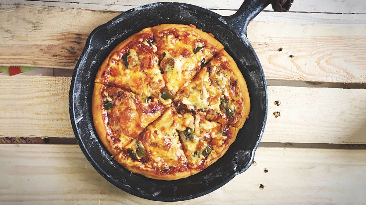 pizza in cast iron skillet