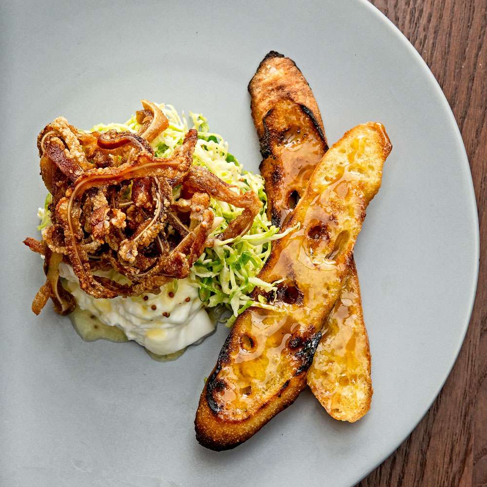 Fresh Burrata, Crispy Pig Ears, Shaved Brussels Sprouts, Grilled Bread with Miso Honey