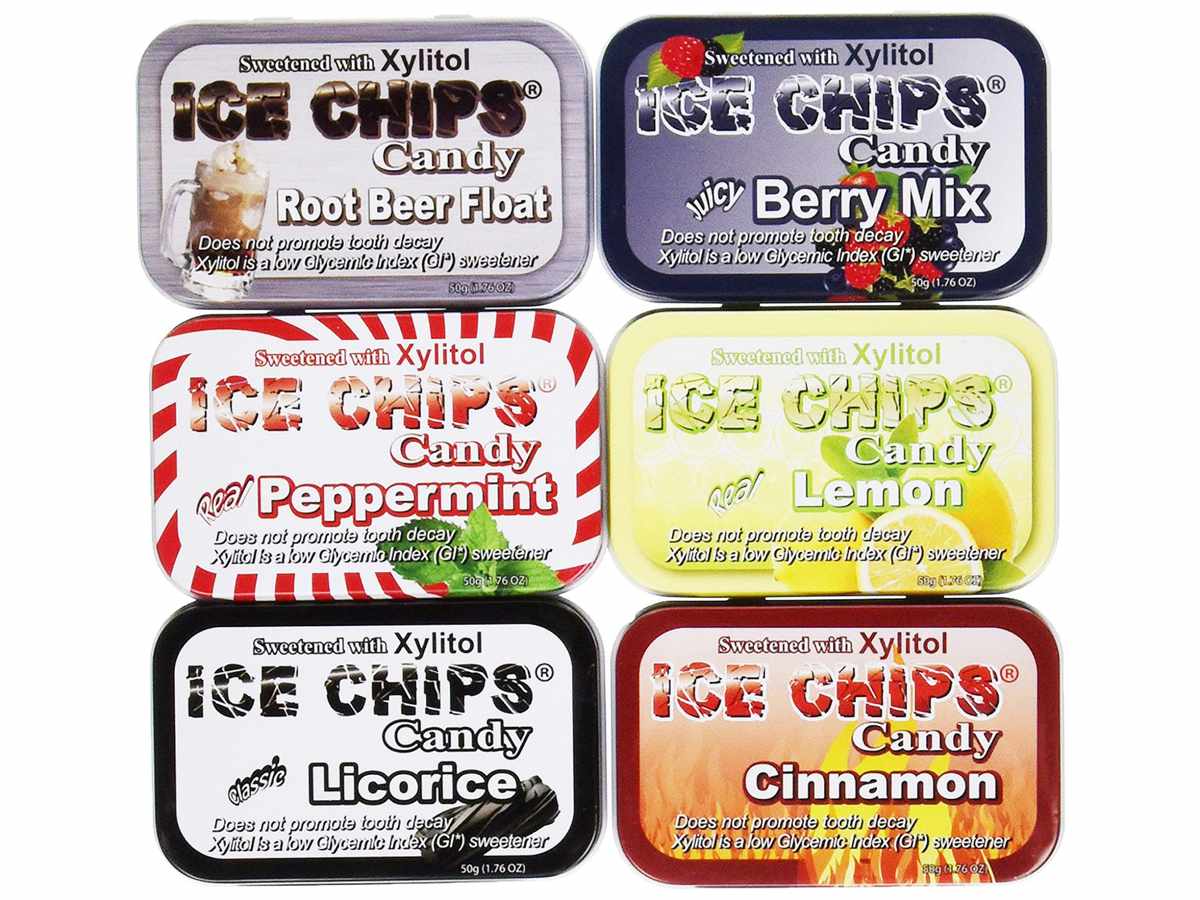 different flavored candies in tins