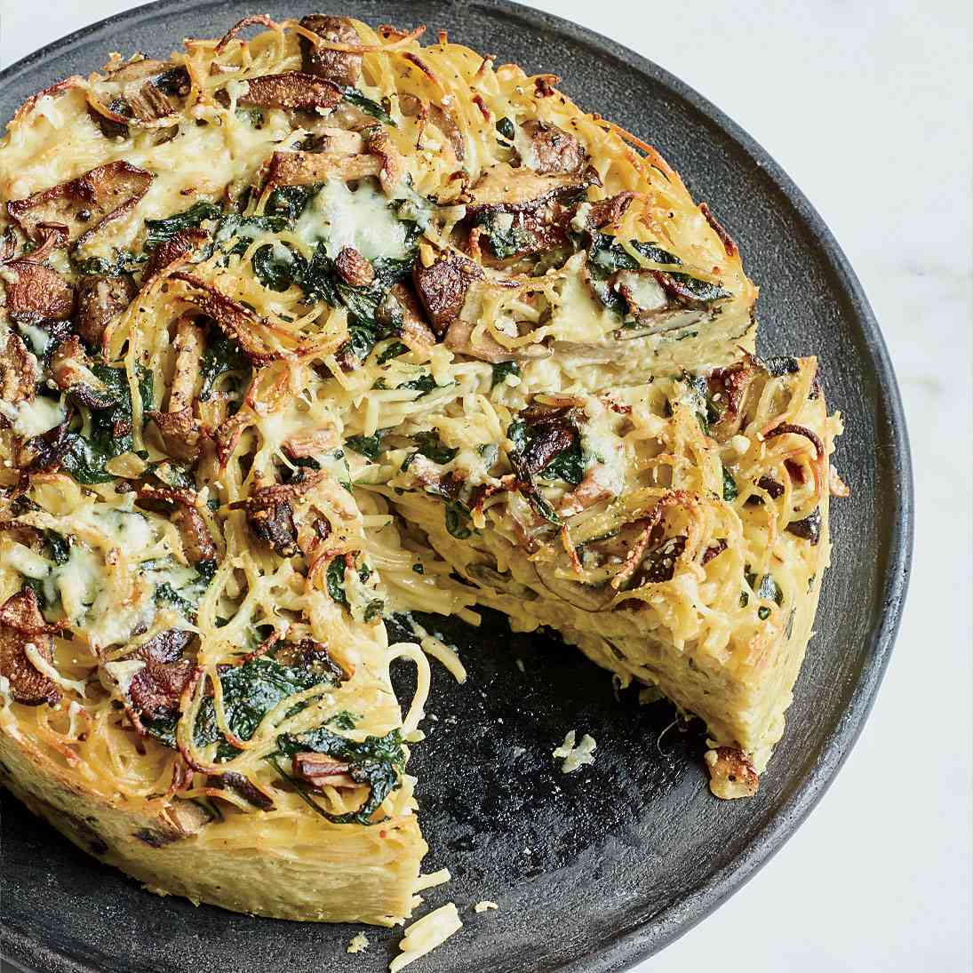 Spaghetti Pie with Wild Mushrooms and Spinach