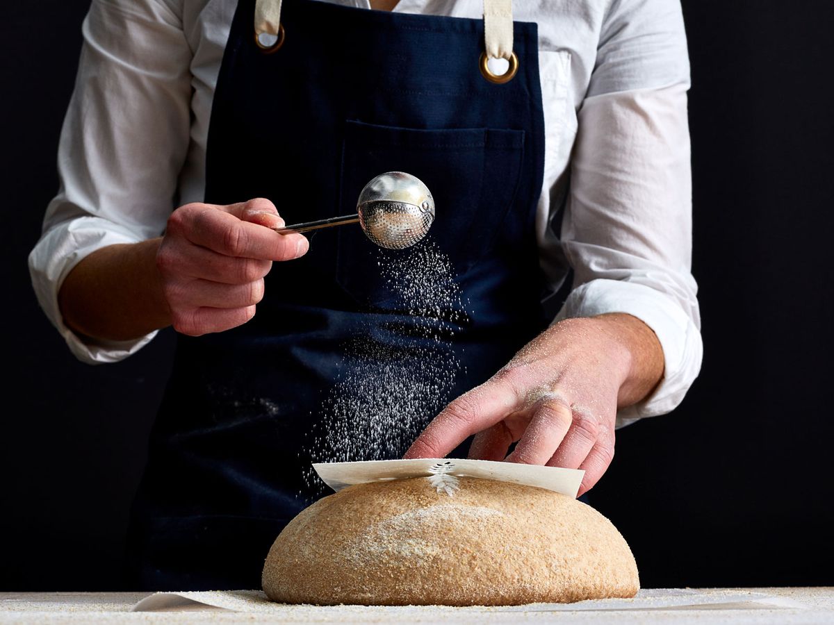 Dusting Flour on Sourdough Bread