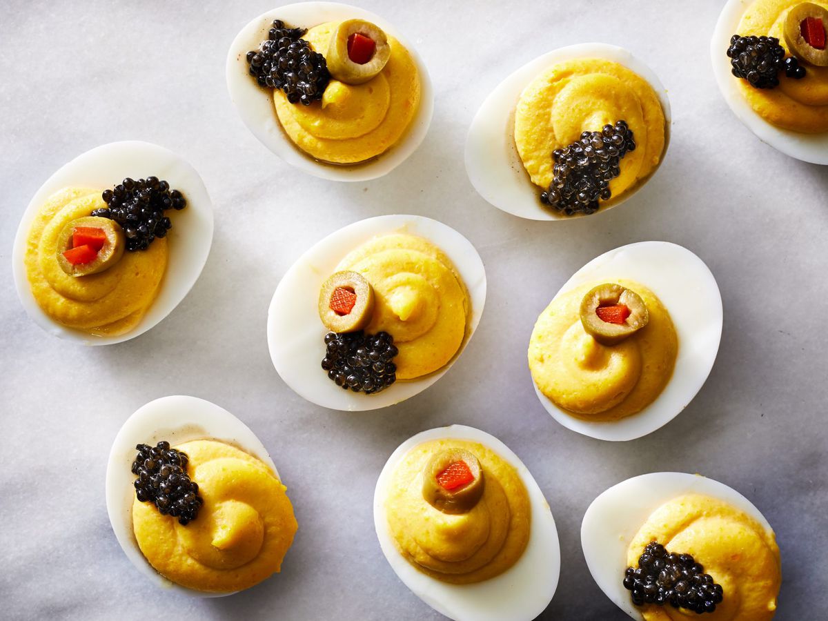 Different deviled egg recipes: An overhead shot of caviar topped deviled eggs. 