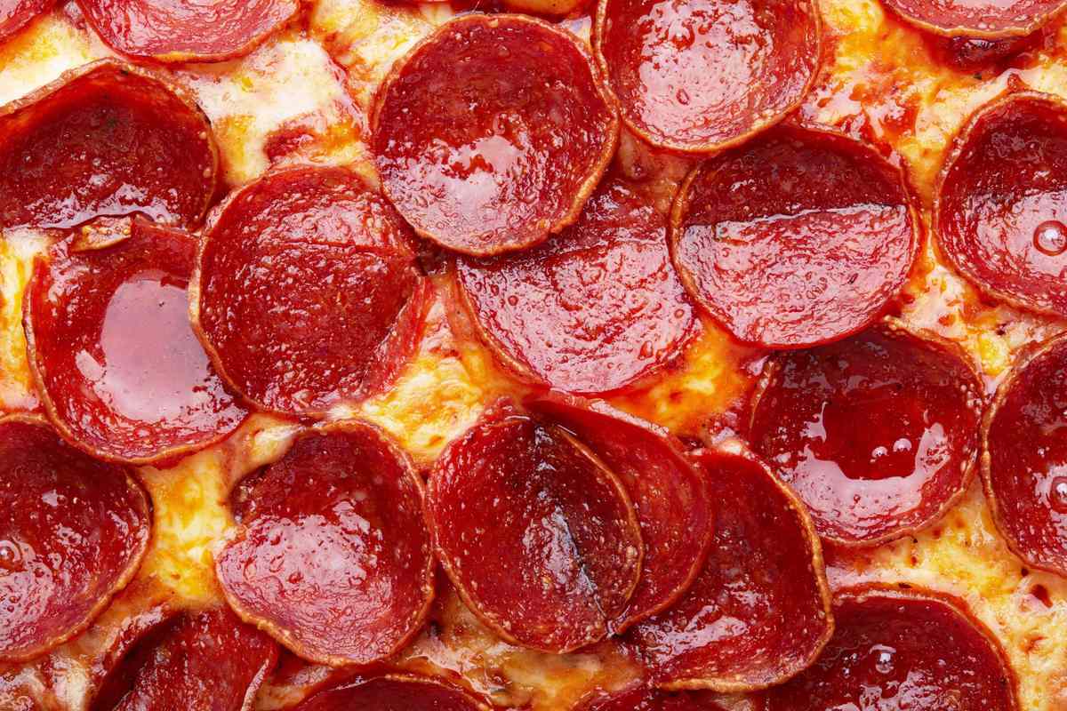 Closeup of Pepperoni pizza as a background