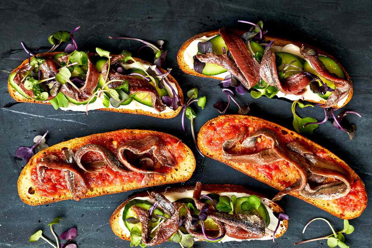 Anchovy Toasts with Fresh Tomato Vinaigrette 