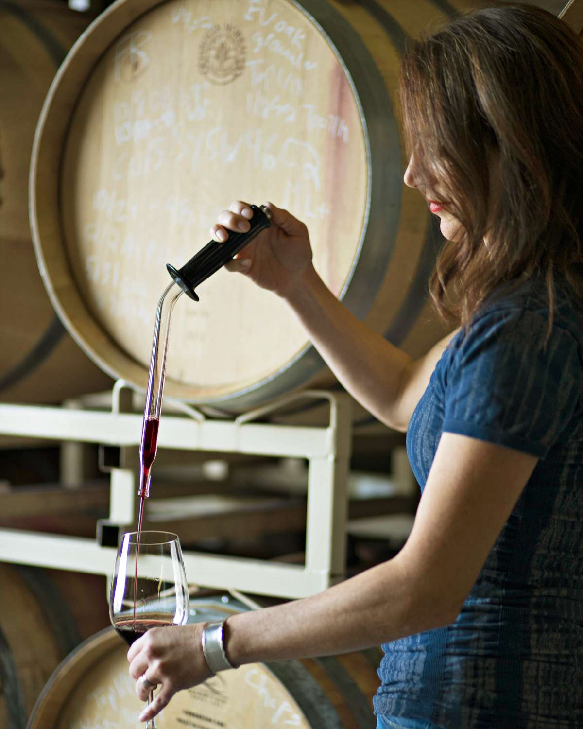 Melanie Krause of Cinder Wines pours a glass