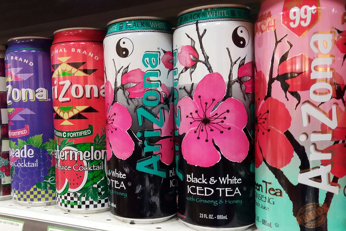 Various cans of Arizona iced tea