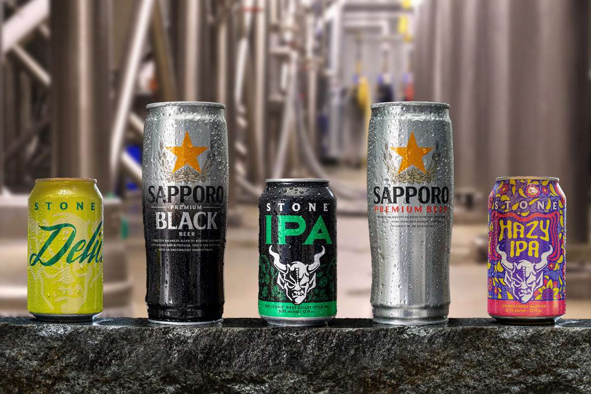 Cans of various beers from Stone Brewing and Sapporo USA