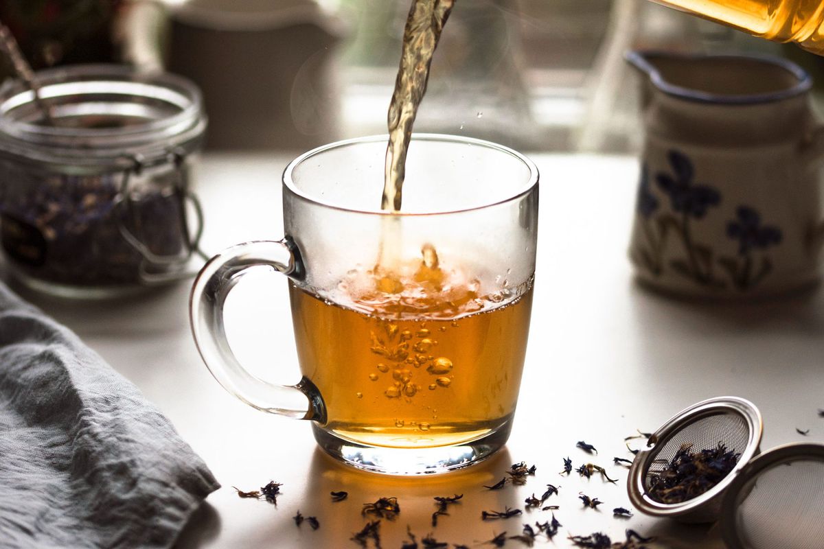 Fresh cup of tea in a glass mug