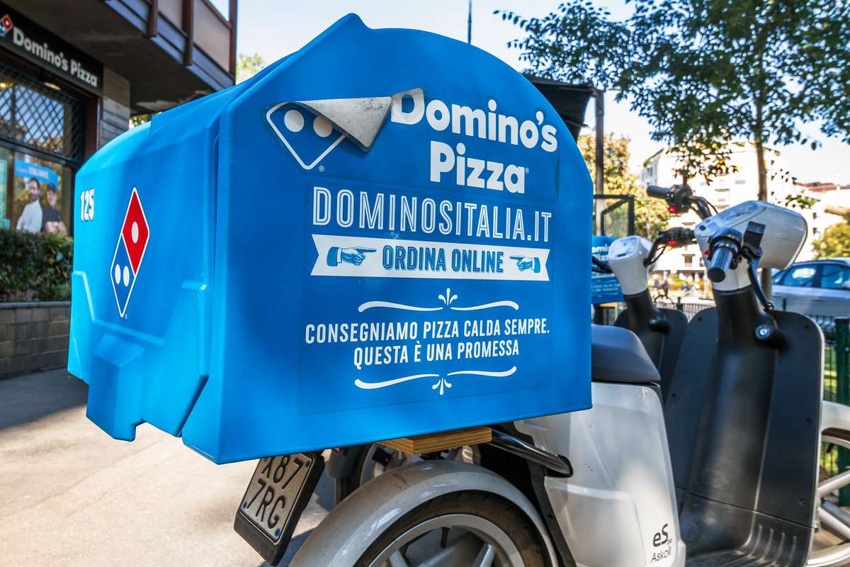 Domino's Pizza scooter in Milan, Italy