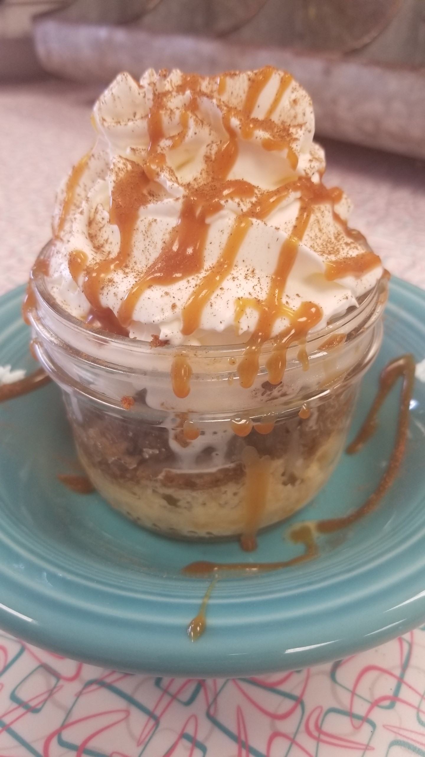 Pumpkin Bread Pudding with Caramel Rum Sauce Recipe | Allrecipes
