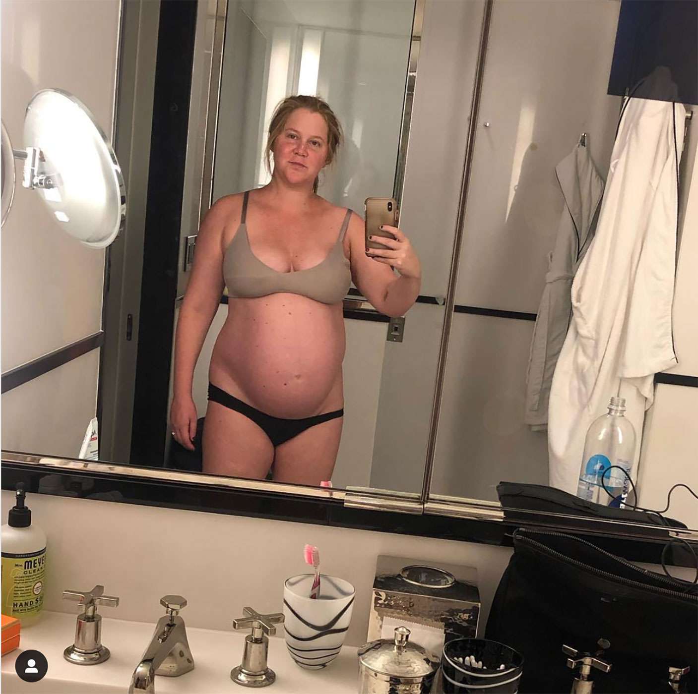 Amy Schumer shares images of herself naked in the bath 